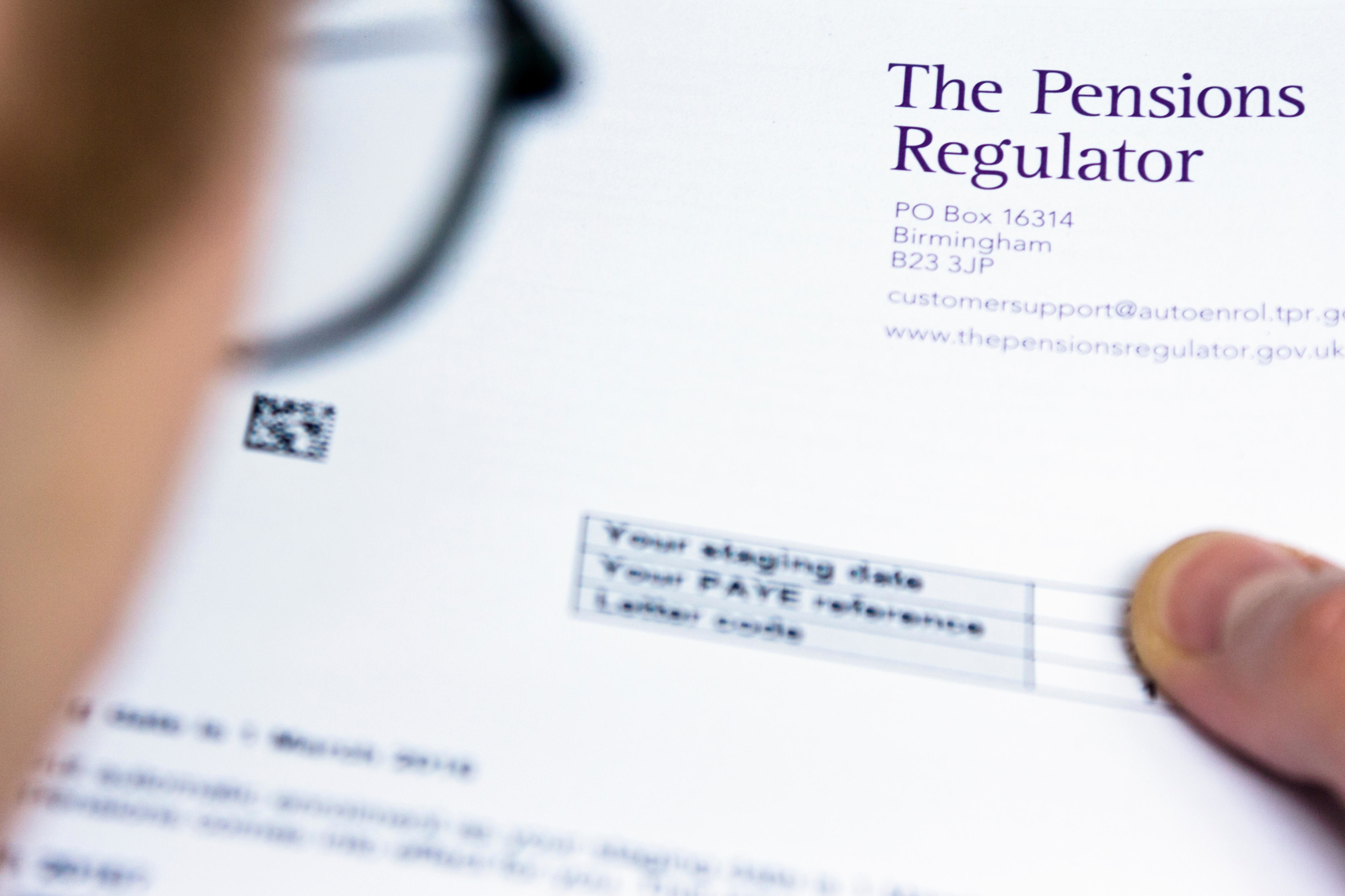 FE4A0X Employer looking at information about the UK government's Pensions Regulator